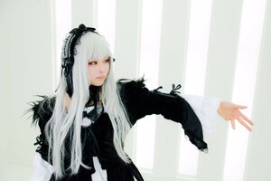 Rating: Safe Score: 0 Tags: 1girl bangs black_dress closed_mouth dress gothic_lolita lolita_fashion long_hair long_sleeves solo striped striped_background suigintou upper_body vertical_stripes very_long_hair white_hair User: admin