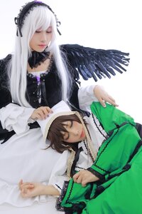 Rating: Safe Score: 0 Tags: 2girls black_wings closed_eyes dress feathers frills hairband long_hair long_sleeves multiple_girls silver_hair solo suigintou suiseiseki wings User: admin