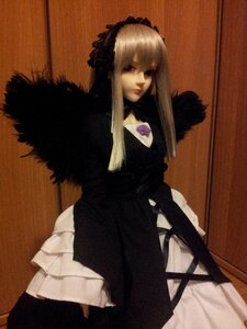 Rating: Safe Score: 0 Tags: 1girl bangs blonde_hair doll dress frills lips long_hair long_sleeves looking_at_viewer rose solo suigintou User: admin