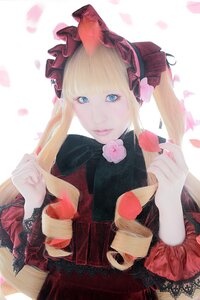 Rating: Safe Score: 0 Tags: 1girl bangs blonde_hair blue_eyes bonnet bow dress drill_hair flower food lolita_fashion long_hair looking_at_viewer petals rose shinku solo striped twintails User: admin