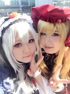 Rating: Safe Score: 0 Tags: 2girls bangs blonde_hair blue_eyes bonnet building city closed_mouth frills hat lips lolita_fashion long_hair looking_at_viewer multiple_cosplay multiple_girls purple_eyes smile tagme white_hair User: admin