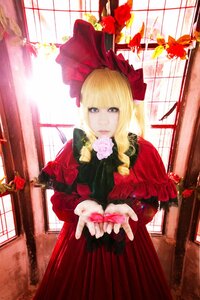 Rating: Safe Score: 0 Tags: 1girl bangs blonde_hair blue_eyes bonnet bow curtains dress drill_hair flower indoors long_hair looking_at_viewer red_dress rose shinku solo window User: admin
