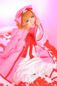Rating: Safe Score: 0 Tags: 1girl blonde_hair bow dress elbow_gloves flower frills hinaichigo pink_bow solo User: admin
