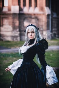 Rating: Safe Score: 0 Tags: 1girl black_dress blurry blurry_background breasts depth_of_field dress lips long_hair long_sleeves looking_at_viewer outdoors photo solo standing suigintou User: admin