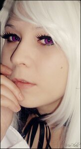 Rating: Safe Score: 0 Tags: 1girl close-up eyelashes face letterboxed lips looking_at_viewer purple_eyes signature solo suigintou white_hair User: admin