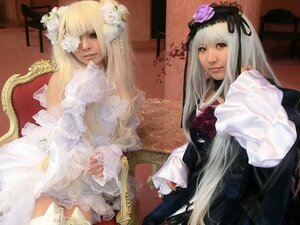 Rating: Safe Score: 0 Tags: 2girls blonde_hair dress eyepatch flower frills gothic_lolita hair_ornament lips lolita_fashion long_hair multiple_cosplay multiple_girls realistic siblings sitting tagme User: admin