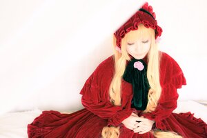 Rating: Safe Score: 0 Tags: 1girl bangs blonde_hair bonnet closed_eyes dress flower long_hair long_sleeves red_dress rose shinku sitting sleeping solo User: admin