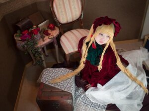 Rating: Safe Score: 0 Tags: 1girl bangs blonde_hair blue_eyes bonnet book chair dress flower food fruit long_hair shinku sitting solo very_long_hair User: admin