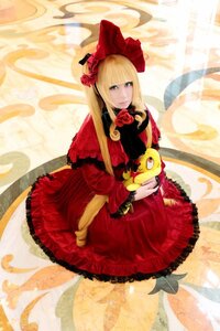 Rating: Safe Score: 0 Tags: 1girl bangs blonde_hair blue_eyes bonnet bow dress flower frills long_hair red_dress rose shinku sitting solo very_long_hair User: admin