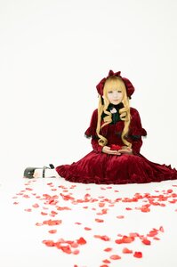 Rating: Safe Score: 0 Tags: 1girl blonde_hair blue_eyes bonnet bow dress flower long_hair petals red_dress shinku sitting solo striped User: admin