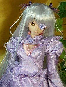 Rating: Safe Score: 0 Tags: 1girl barasuishou doll dress eyepatch flower frills hair_ornament long_hair rose solo traditional_media yellow_eyes User: admin