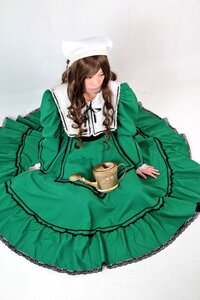 Rating: Safe Score: 0 Tags: 1girl brown_hair closed_eyes dress green_dress long_hair long_sleeves sitting solo suiseiseki User: admin