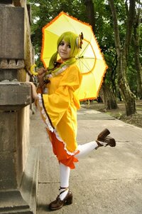 Rating: Safe Score: 0 Tags: 1girl blonde_hair holding_umbrella kanaria parasol shoes solo umbrella User: admin