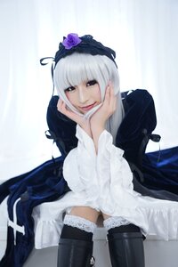 Rating: Safe Score: 0 Tags: 1girl black_legwear boots closed_mouth dress flower long_hair looking_at_viewer sitting smile solo suigintou thighhighs white_hair User: admin