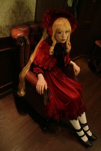 Rating: Safe Score: 0 Tags: 1girl blonde_hair blue_eyes bonnet chair dress flower frills lips long_hair looking_at_viewer red_dress rose shinku shoes sitting solo User: admin