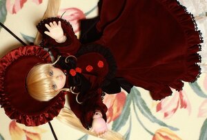 Rating: Safe Score: 0 Tags: 1girl blonde_hair bonnet doll dress flower frills lace long_sleeves looking_at_viewer outstretched_arm red_dress rose shinku solo umbrella User: admin