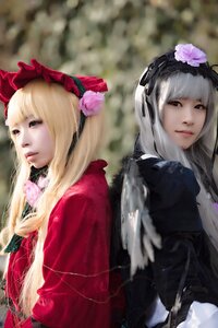 Rating: Safe Score: 0 Tags: 2girls bangs blonde_hair blue_eyes blunt_bangs blurry bonnet capelet flower lips long_hair looking_at_viewer multiple_cosplay multiple_girls photo realistic rose shinku silver_hair suigintou tagme User: admin