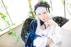 Rating: Safe Score: 0 Tags: 1girl bangs black_wings closed_mouth doll_joints dress feathered_wings feathers flower hairband jewelry lips long_hair long_sleeves looking_at_viewer nail_polish plant red_eyes rose solo suigintou upper_body wings User: admin