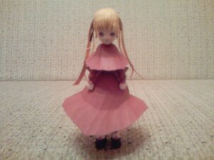 Rating: Safe Score: 0 Tags: 1girl blonde_hair blurry depth_of_field doll dress long_hair long_sleeves looking_at_viewer photo red_dress shinku solo standing User: admin