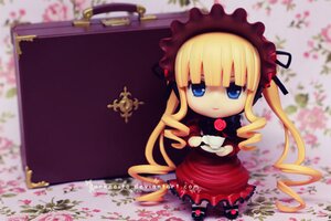 Rating: Safe Score: 0 Tags: 1girl blonde_hair blue_eyes blurry blurry_background blurry_foreground bonnet bow chibi cup depth_of_field doll dress drill_hair figure flower long_hair long_sleeves looking_at_viewer photo red_dress shinku sitting solo teacup User: admin