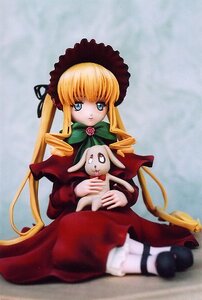Rating: Safe Score: 0 Tags: 1girl bangs blonde_hair blue_eyes bonnet bow bowtie cat doll dress expressionless flower full_body green_bow holding long_hair long_sleeves looking_at_viewer rain red_dress shinku sidelocks sitting solo twintails very_long_hair User: admin