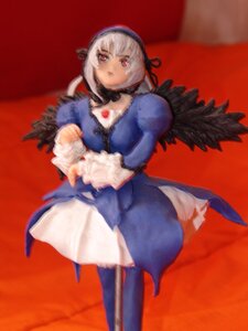 Rating: Safe Score: 0 Tags: 1girl blurry boots breasts choker depth_of_field doll dress long_sleeves looking_at_viewer red_background solo standing suigintou thighhighs white_hair wings User: admin