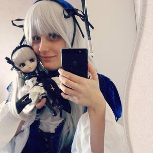 Rating: Safe Score: 0 Tags: 1girl blonde_hair blue_eyes cellphone dress hair_ribbon holding holding_phone phone photo realistic ribbon short_hair smartphone solo suigintou white_hair User: admin