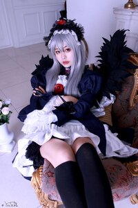 Rating: Safe Score: 0 Tags: 1girl black_legwear dress flower frills lips signature silver_hair sitting solo suigintou thighhighs underwear User: admin