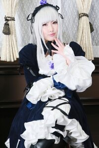 Rating: Safe Score: 0 Tags: 1girl bangs curtains dress flower frills hairband indoors lips long_hair long_sleeves looking_at_viewer red_eyes rose silver_hair sitting solo suigintou window User: admin