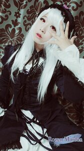 Rating: Safe Score: 0 Tags: 1girl black_dress dress gothic_lolita lace lips lolita_fashion long_hair long_sleeves looking_at_viewer red_eyes ribbon solo suigintou white_hair User: admin