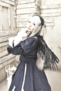 Rating: Safe Score: 0 Tags: 1girl bangs black_dress black_ribbon black_wings blurry blurry_background blurry_foreground building church depth_of_field dress feathered_wings feathers hairband long_hair long_sleeves looking_at_viewer outdoors photo ribbon solo standing suigintou white_hair wings User: admin