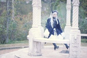 Rating: Safe Score: 0 Tags: 1girl bangs blurry blurry_background closed_mouth day depth_of_field dress frills hairband long_hair long_sleeves outdoors sitting solo standing suigintou white_hair User: admin