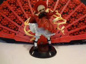 Rating: Safe Score: 0 Tags: 1girl bangs blonde_hair blue_eyes blunt_bangs bow doll dress drill_hair frills long_hair long_sleeves mary_janes red_dress shinku shoes solo twintails weapon white_legwear User: admin