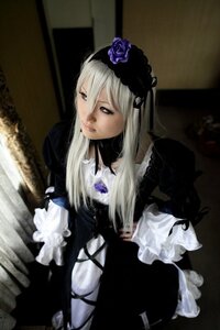 Rating: Safe Score: 0 Tags: 1girl black_dress dress flower frills gothic_lolita lolita_fashion long_hair long_sleeves rose silver_hair solo suigintou wings User: admin