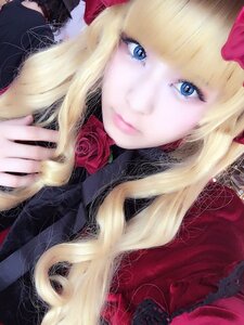 Rating: Safe Score: 0 Tags: 1girl bangs blonde_hair blue_eyes eyelashes flower lips long_hair looking_at_viewer red_flower red_rose rose shinku solo User: admin