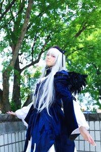 Rating: Safe Score: 0 Tags: 1girl bangs dress flower hairband long_hair long_sleeves looking_at_viewer outdoors solo standing suigintou tree white_hair wings User: admin