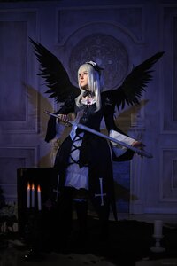 Rating: Safe Score: 0 Tags: 1girl bandages black_wings dress feathered_wings feathers indoors long_hair solo suigintou sword weapon white_hair wings User: admin