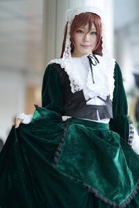 Rating: Safe Score: 0 Tags: 1girl blurry blurry_background brown_hair depth_of_field dress frills green_dress green_eyes heterochromia lips long_hair long_sleeves looking_at_viewer red_eyes ribbon skirt_hold smile solo suiseiseki User: admin