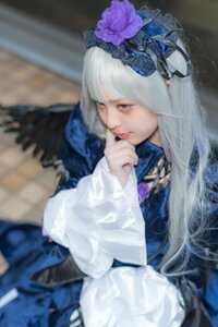 Rating: Safe Score: 0 Tags: 1girl blurry blurry_background blurry_foreground depth_of_field dress flower hair_flower hair_ornament lips long_hair long_sleeves photo red_eyes sitting solo suigintou white_hair User: admin