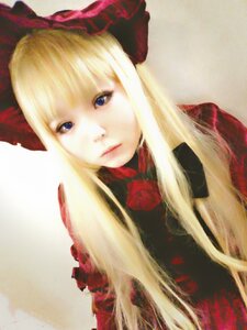 Rating: Safe Score: 0 Tags: 1girl bangs blonde_hair blue_eyes bow closed_mouth flower lips long_hair looking_at_viewer rose shinku solo User: admin