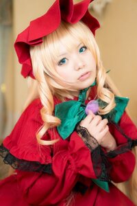 Rating: Safe Score: 0 Tags: 1girl blonde_hair blue_eyes blurry bow capelet depth_of_field dress drill_hair flower holding_flower lips long_hair looking_at_viewer photo realistic red_capelet red_dress shinku solo User: admin