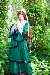 Rating: Safe Score: 0 Tags: 1girl brown_hair dress green_dress head_scarf nature outdoors solo standing suiseiseki User: admin
