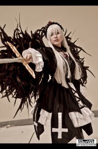Rating: Safe Score: 0 Tags: 1girl dress flower gothic_lolita hairband letterboxed lips lolita_fashion long_hair long_sleeves outstretched_arm outstretched_hand pale_skin rose solo standing suigintou weapon white_hair User: admin