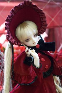 Rating: Safe Score: 0 Tags: 1girl blonde_hair blurry blurry_background bonnet depth_of_field doll dress flower frills lolita_fashion long_hair long_sleeves looking_at_viewer red_dress rose shinku solo User: admin
