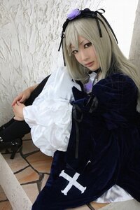 Rating: Safe Score: 0 Tags: 1girl blonde_hair dress hair_ribbon holding lips long_hair long_sleeves realistic ribbon solo suigintou User: admin