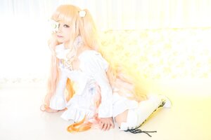 Rating: Safe Score: 0 Tags: 1girl blonde_hair boots dress flower hair_ornament kirakishou lips long_hair sitting solo striped very_long_hair white_dress User: admin