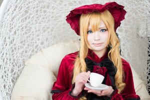 Rating: Safe Score: 0 Tags: 1girl blonde_hair blue_eyes bonnet cup flower holding_cup long_hair long_sleeves looking_at_viewer rose saucer shinku smile solo tea teacup User: admin