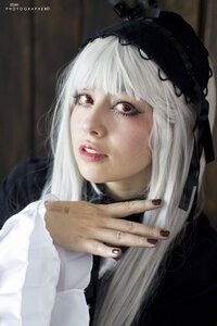 Rating: Safe Score: 0 Tags: 1girl bangs black_nails blunt_bangs blurry fingernails gothic_lolita lips long_hair nail_polish red_eyes red_lips red_nails solo suigintou User: admin