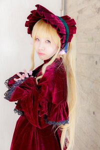 Rating: Safe Score: 0 Tags: 1girl blonde_hair blue_eyes bonnet dress frills long_hair long_sleeves looking_at_viewer photo red_dress shinku solo User: admin