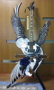 Rating: Safe Score: 0 Tags: 1girl black_wings doll dress feathered_wings feathers flower frills guitar hairband instrument long_hair looking_at_viewer photo purple_eyes rose silver_hair solo suigintou wings User: admin